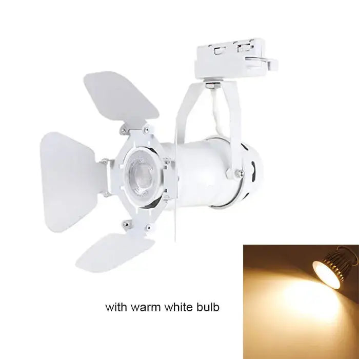 White decorbites artwork led track lighting fixture with four adjustable leaf-shaped reflectors and warm white bulbs