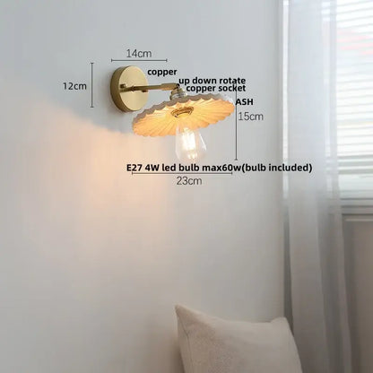 Copper wall sconce with scalloped translucent glass shade and exposed Edison bulb for DecorBites ash wood LED lighting