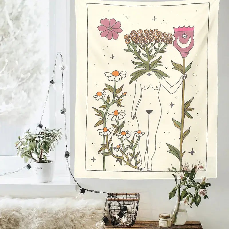A cream-colored decorbites astrology tarot card tapestry featuring a stylized figure with floral elements holding a crowned staff