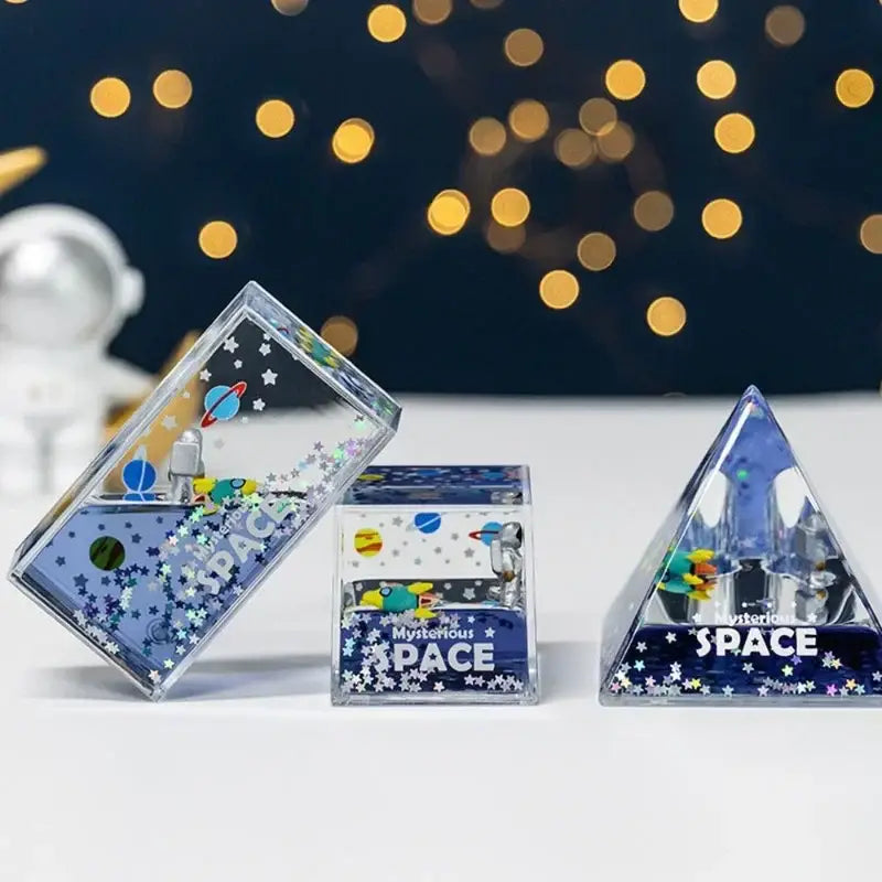Clear geometric space-themed decorbites astronaut drift keychain with liquid hourglass and miniature astronaut figures inside