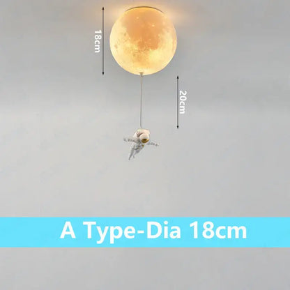 A warm glowing spherical decorbites astronaut globe ceiling light with a dangling astronaut figure for kids room