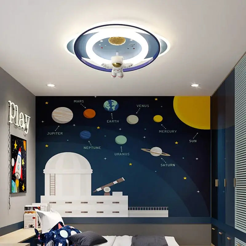 Circular ceiling light with glowing rings and suspended astronaut figure for decorbites astronaut kids bedroom lighting