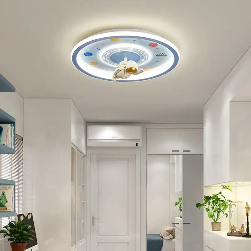 Decorbites astronaut led circular ceiling light with white astronaut figure and colorful planets on blue background for kids room