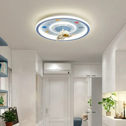 Decorbites astronaut led circular ceiling light with white astronaut figure and colorful planets on blue background for kids room