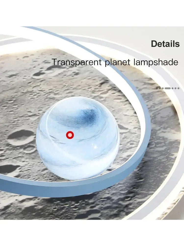 Decorbites astronaut led chandelier with transparent blue gradient lampshade and red dot over lunar surface backdrop