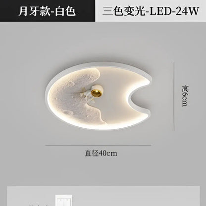White moon-shaped decorbites astronaut moon acrylic ceiling lamp with textured cratered surface and gold-toned bulb