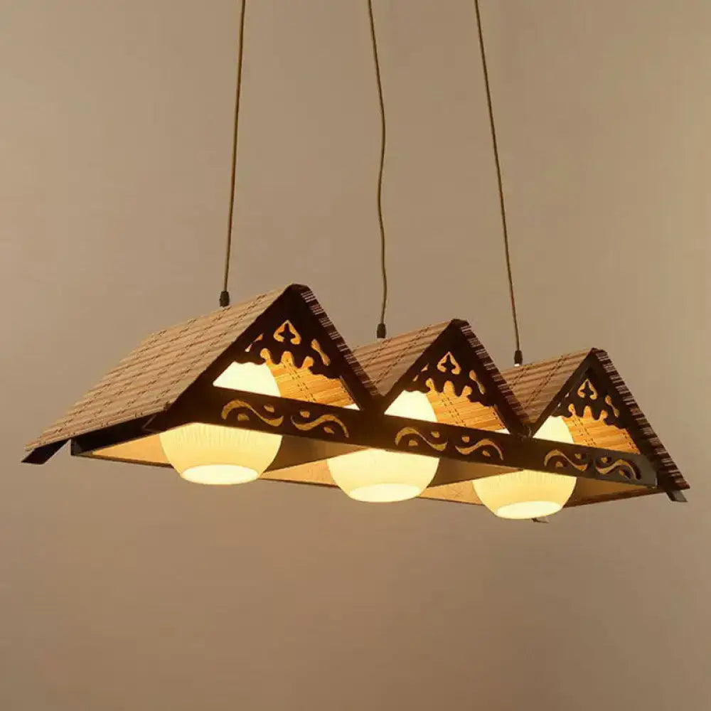 DecorBites™ bamboo pendant light with three triangle roof woven shades and dark wood trim for triangle roof restaurant use