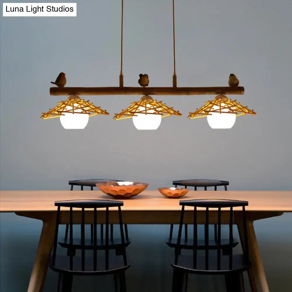 Natural wood beam pendant light decorbites bamboo pendant lighting with three woven bamboo shades white glass and art deco birds