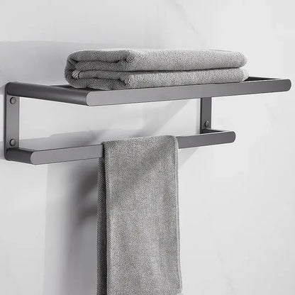 Modern matte black metal towel rack with sleek minimalist design holding gray towels from decorbites bathroom hardware set