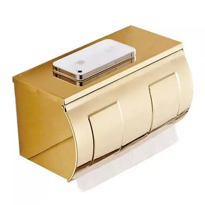 Gold-colored metallic decorbites bathroom paper holder with three roll compartments and sleek modern design for paper phone storage
