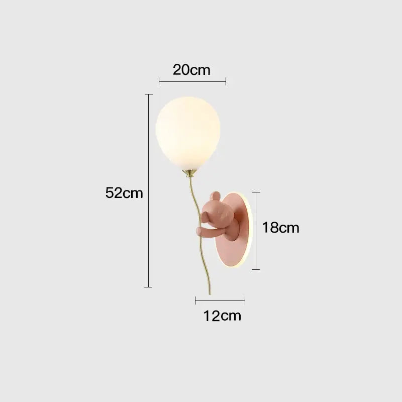 Pastel pink DecorBites bear artistic kids wall lamp with frosted glass balloon and gold-toned metal stem wall lamp