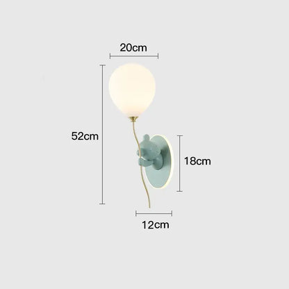 Decorbites bear artistic wall lamp featuring a matte teal bear holding a gold stem with white spherical bulb for kids room
