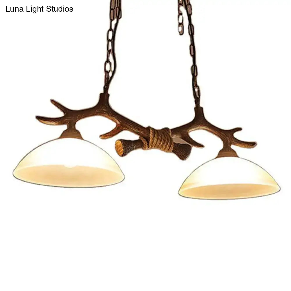 Decorbites beige glass dark coffee pendant light with two warm-toned shades and antler decor for ceiling light use