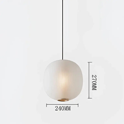 Decorbites black glass table light featuring a minimalist frosted glass ball shade and thin black cord for bedroom use