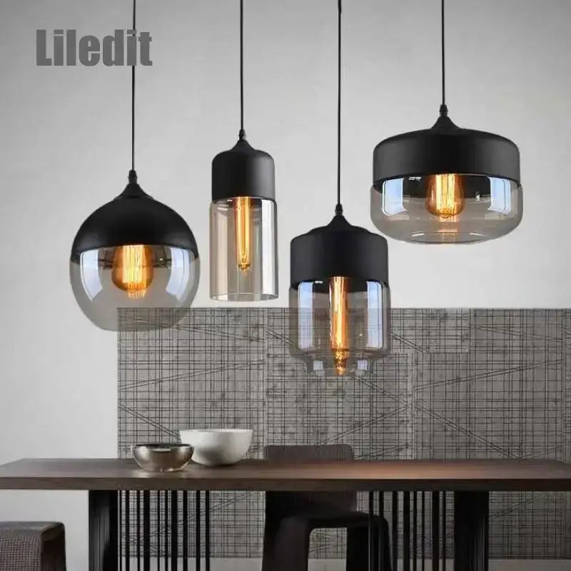 Set of three decorbites™ black glass pendant light fixtures with smoked glass shades for modern indoor decor and dining rooms