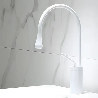 White modern kitchen basin faucet with curved spout and minimalist design for DecorBites black gold basin use