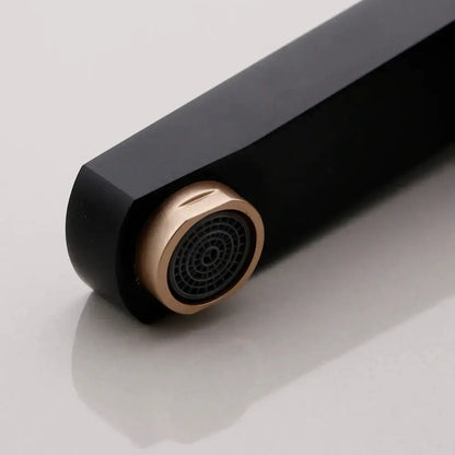 Decorbites black gold bathroom faucet with black matte finish, rose gold spout, and textured nozzle in brass aluminum