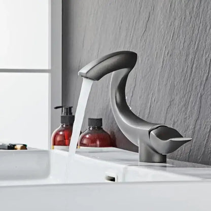 Modern matte black decorbites black gold brass bathroom faucet mixer with sleek curved design and single spout deck mounted