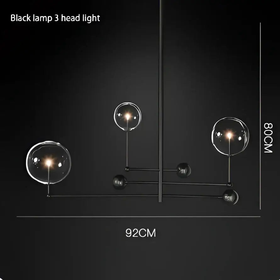 DecorBites black gold brass chandelier with three clear glass globe shades and vintage geometric lighting design