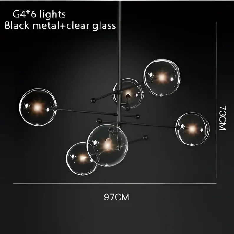 Modern black gold brass chandelier by decorbites featuring six clear glass globe lights and vintage geometric design