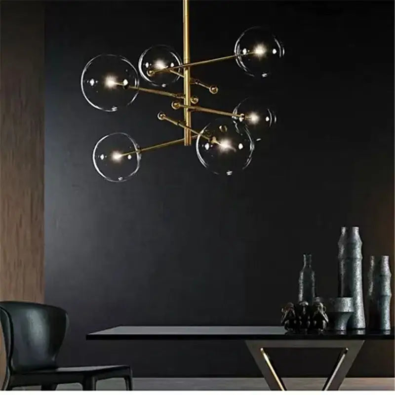 Decorbites black gold brass chandelier with clear glass globe bulbs features vintage geometric black gold lighting design
