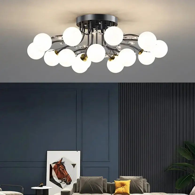 Modern black metal ceiling light with frosted white spherical bulbs in a decorbites black gold chandelier design