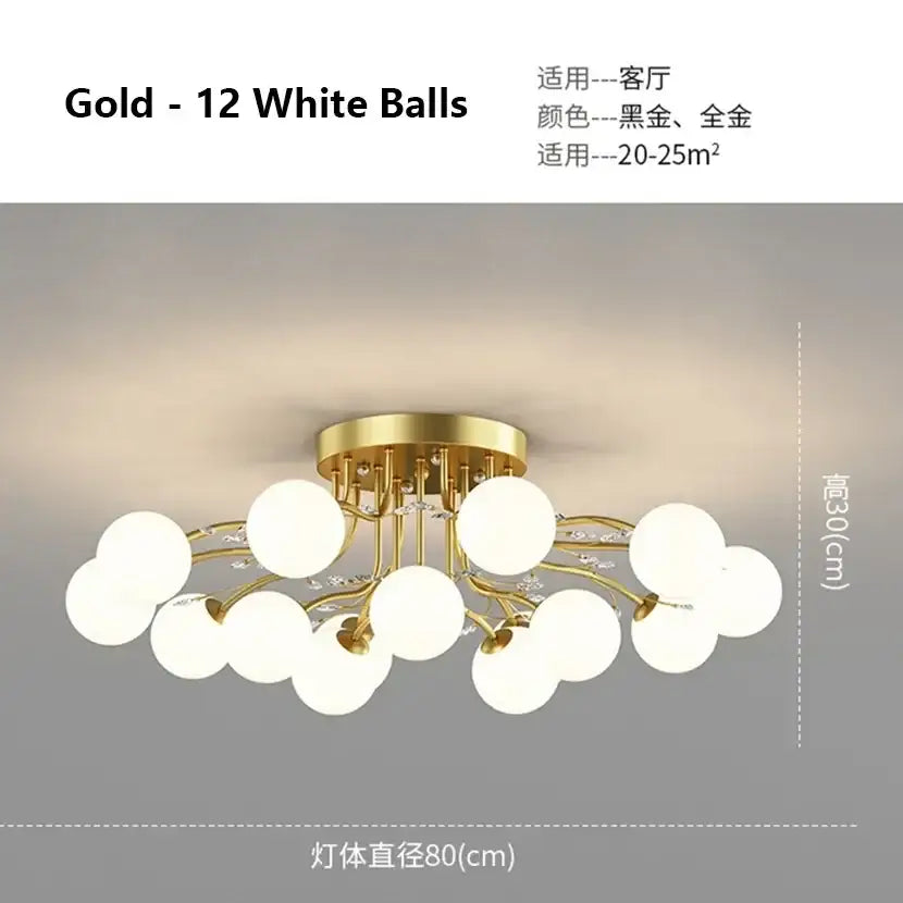 DecorBites black gold chandelier with gold-toned branching design and twelve frosted white glass globe bulbs
