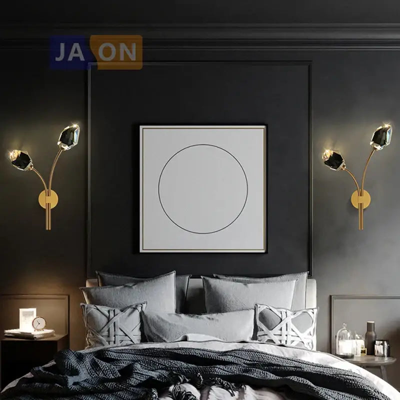 Gold-toned wall sconce light with faceted black crystal accents from DecorBites for bedroom and corridor lighting