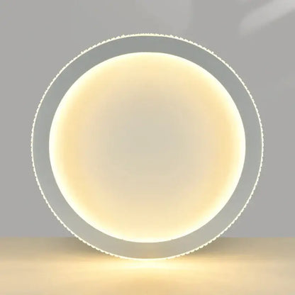 Circular recessed ceiling light with sleek white frame and warm illumination in decorbites black gold crystal chandelier design