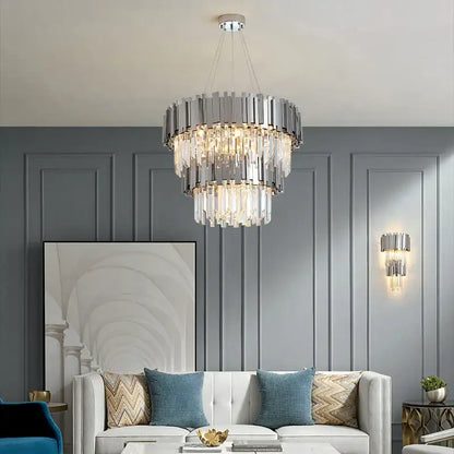 A modern black gold crystal DecorBites lighting fixture with chrome bars and cascading clear crystal prisms chandelier
