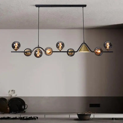 Modern black metal DecorBites black gold glass chandelier with spherical smoked glass shades and gold glass triangular accent