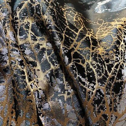 Decorbites black gold jacquard egyptian cotton bedding set with intricate web-like black and gold metallic fabric pattern