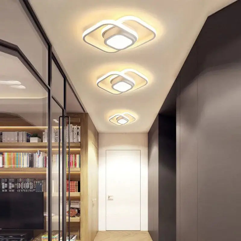 Modern square-shaped decorbites black gold led ceiling light with sleek white frame and warm led illumination for indoor use