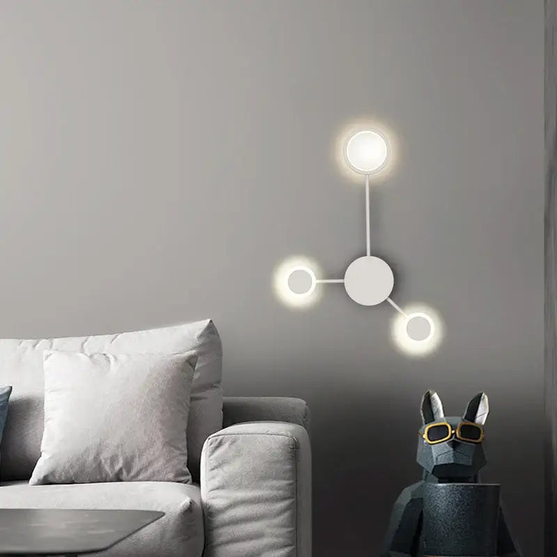 Modern white minimalist wall lamp with three circular lights in decorbites black gold led indoor design