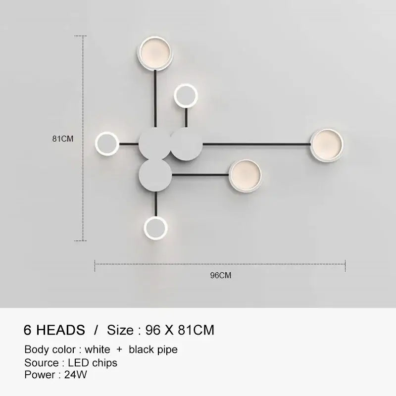 Modern minimalist DecorBites black gold wall lamp with six circular white heads and black piping for indoor use