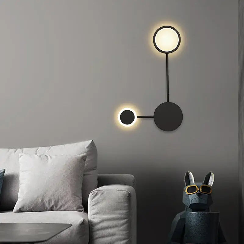 DecorBites black gold LED wall lamp with modern black circular sconce featuring glowing illuminated circles for indoor use
