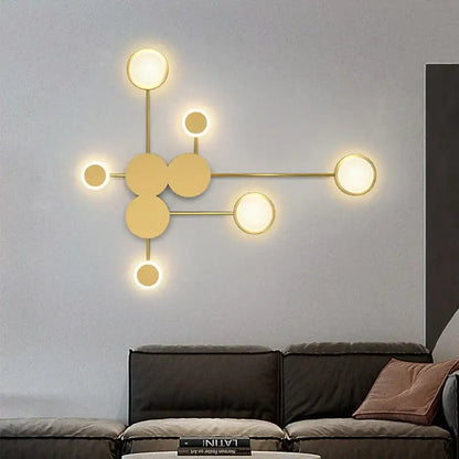Modern gold-toned DecorBites black gold LED wall lamp with molecular circular light fixtures for indoor spaces