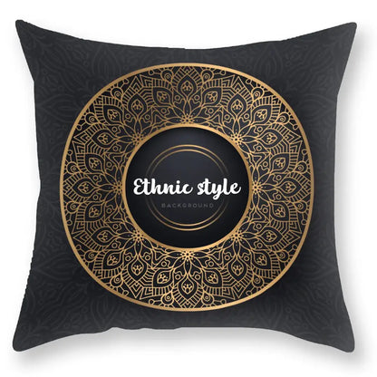 Black throw pillow with intricate gold mandala and white ethnic style text by decorbites black gold luxury design