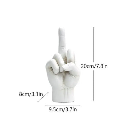 White ceramic hand sculpture with index finger raised as a decorbites black gold modern home decor figurine