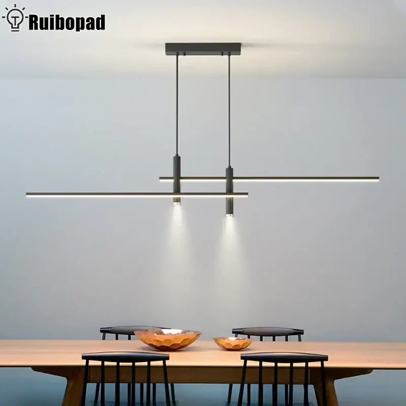 Modern black gold nordic pendant chandelier with two horizontal led bars and downward-facing spotlights for dining table