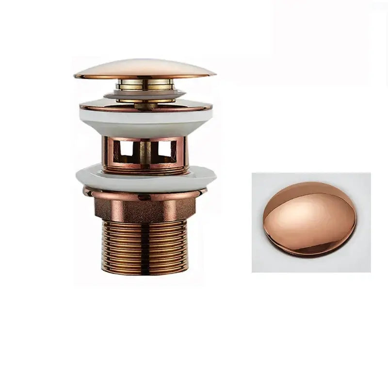 Copper-finished bathtub overflow drain with sleek design and white ceramic accents in decorbites black gold faucet accessory kit