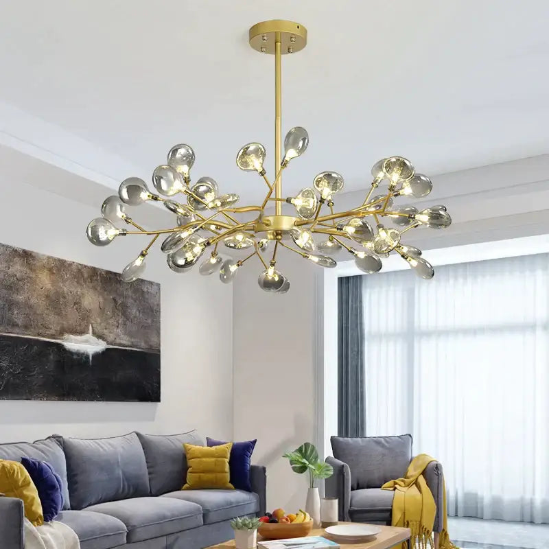 Gold-toned decorbites black gold tree branch chandelier with clear teardrop glass globes for vintage living room decor