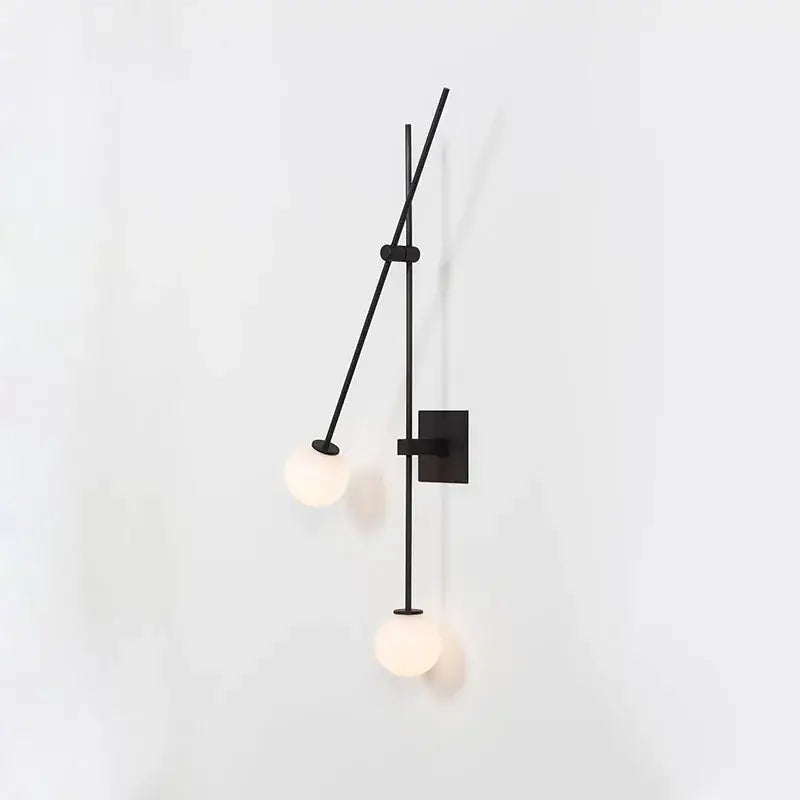 Modern black golden LED wall sconce by DecorBites black golden with two frosted glass globe shades for foyer and bedroom