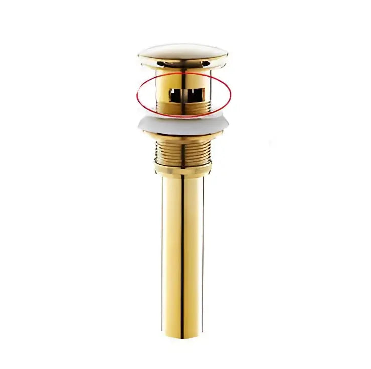 Gold-colored sleek metal drain stopper with cylindrical body and circular top for DecorBites waterfall basin faucet