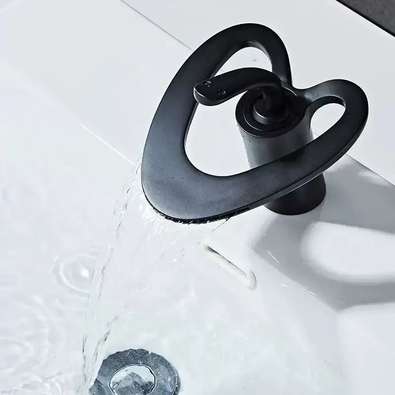 Decorbites™ black matte snake-shaped waterfall basin faucet with brass finish for hot and cold water mixer tap