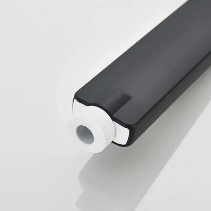 Black rectangular plastic bottle with white threaded cap for decorbites hand-held shower head water saving use