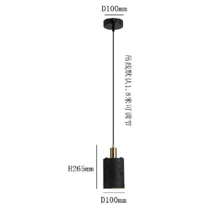 DecorBites black hole stone chandelier featuring a black cylindrical pendant with textured surface and gold accents