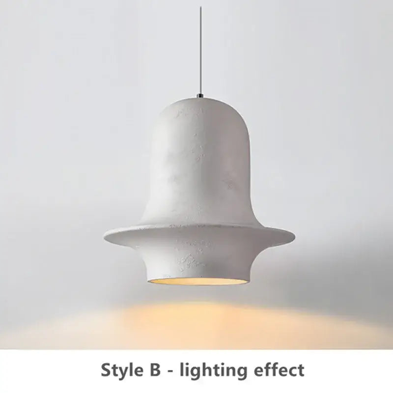 White ceramic bell-shaped pendant light with matte finish and warm glow for decorbites black industrial chandelier