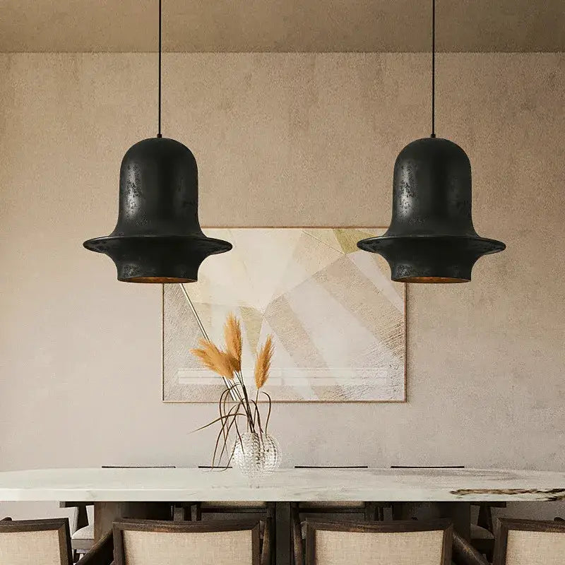 Two matte black bell-shaped pendant lights with rustic finish in decorbites black industrial chandelier for dining room