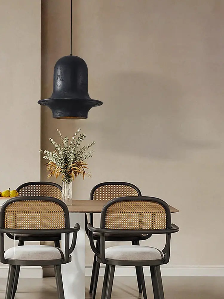 Decorbites black industrial chandelier featuring a black matte bell-shaped pendant light with gold interior for cafe decor